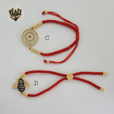 (1-60100) - Pulsera de Hilo Rojo Chapada en Oro.